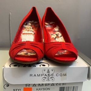 worn maybe 3 times. been in the closet forever. red wedges from macys.